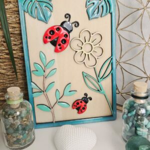 Cadre enchanté – Les Coccinelles et la Fleur